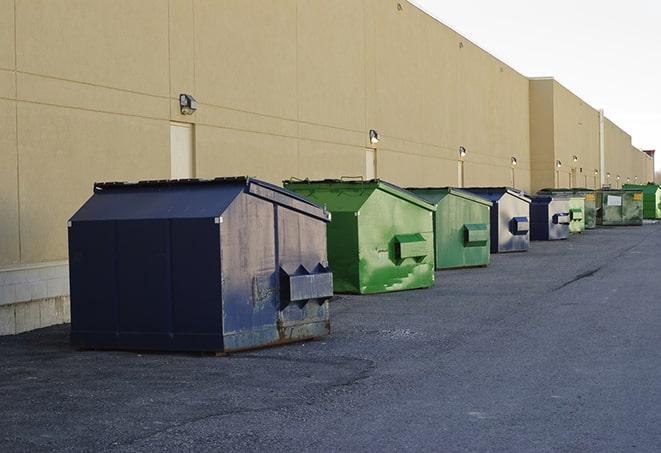 red and green waste bins at a building project in Bronxville, NY